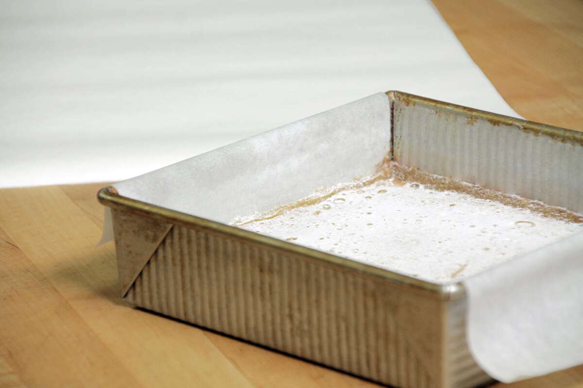 Baking with a parchment paper sling via @kingarthurflour